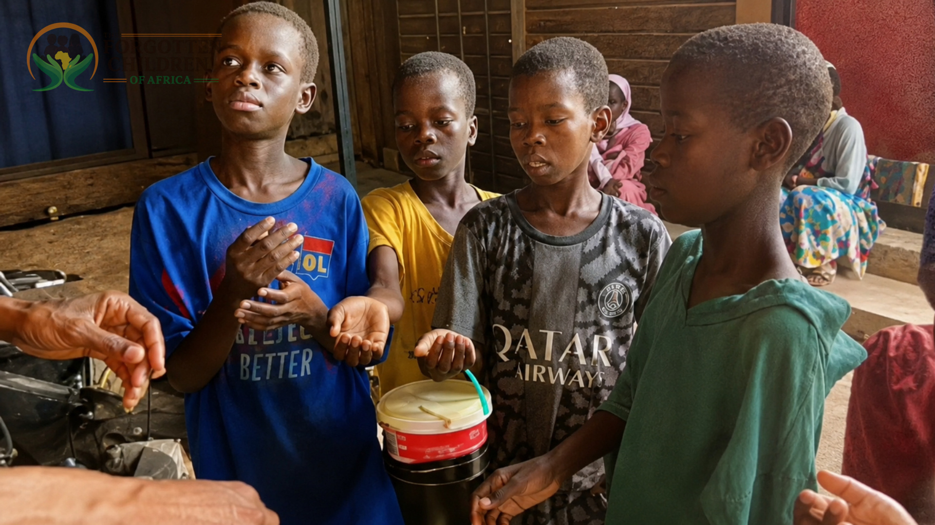 Children receiving food and drinks