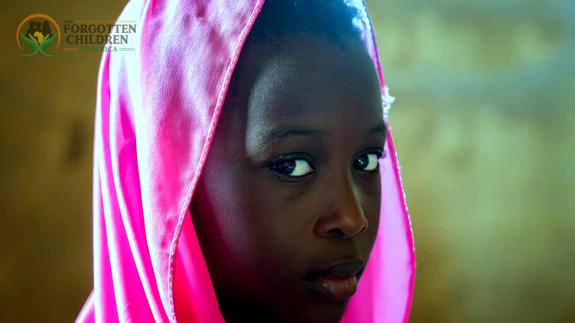 Girl in pink headscarf portrait