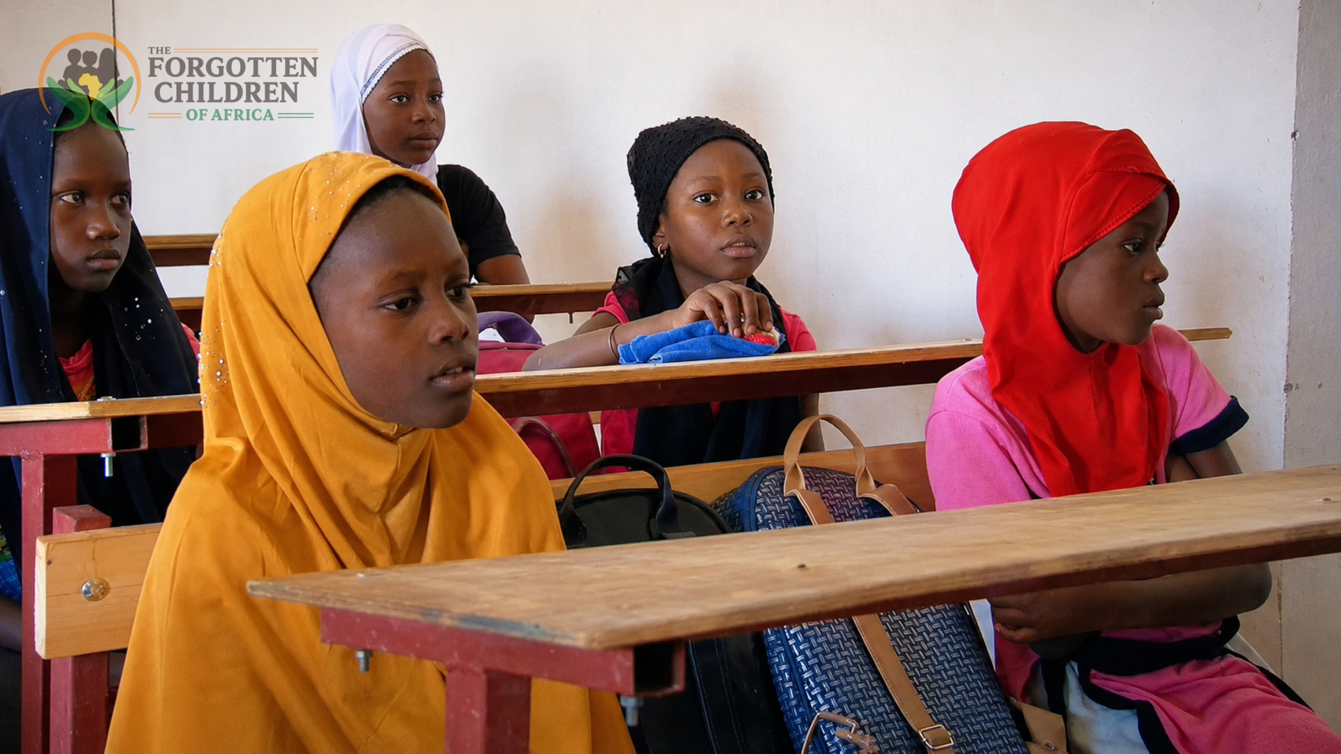 Girls in colorful headscarves in class